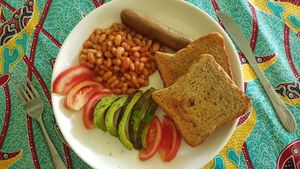 Vegan breakfast with vegan sausage at Pakachere in Zomba