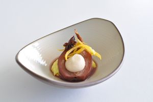 Shiraz Poached Pear with Lemon Curd and Plant-Based Brie at Halapua by Kapuhala in Koh Samui