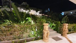 Looking up from restaurant to reception at Halapua by Kapuhala in Koh Samui