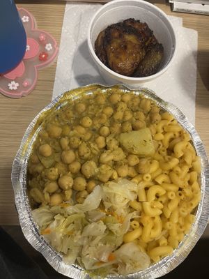 plantains, mac and cheeze, cabbage and chickpeas and potato’s   at Desert Island Eatery in Phoenix