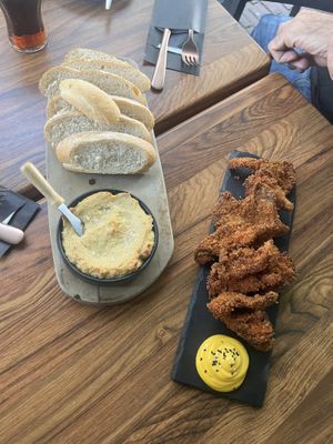 Bread with cashew “Camembert”, and deep fried oyster mushrooms with yuzu mayo dressing  at New Vegas in Haarlem