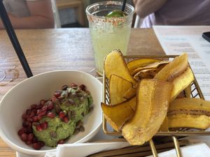 Guacamole with Pumpkin Seeds & Pomegranates. Served with Plantain Chips  at Tocaya Modern Mexican - Fashion Square in Scottsdale