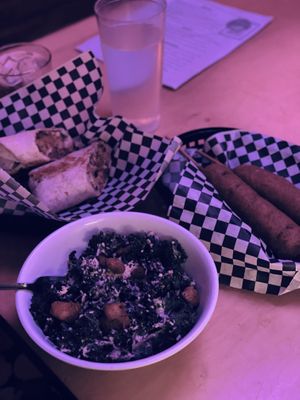 Falafel wrap, kale caesar, and vegan corn dogs  at Sputnik in Denver