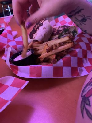 caesar salad wrap!!! be sure to check out the vintage photo booth!!!!   at Sputnik in Denver