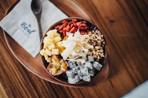 " Acai Bowl "- Acai berry, passion fruit, pineapple, dragon fruit, coconut chip, homemade granola, goji berry. at Hosay Bowl in Phuket