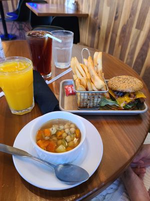 Bistro Burger, fries, and veggie soup at Vegan Avenue in San Antonio