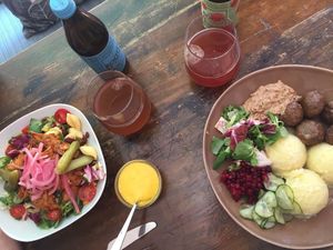 BBQ Oumph salad & Vegan Meatballs and Mashed Potatoes with 2 fizzy Kombucha at Vegano's in Uppsala