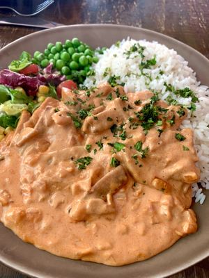 Super creamy and comforting stew with sausages  at Vegano's in Uppsala