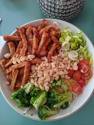 Soysticks on rice noodles with peanut sauce at Vegano's in Uppsala