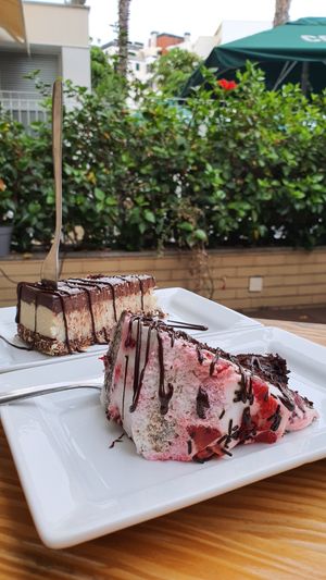 Bounty cheesecake and black forest sponge cake with cream at Mundo Vegan - Vegan World in Funchal