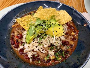 Chilli Supremo - rice, beans, mushrooms, peppers, celery, sweet corn, tomato, chili, avocado and nachos. DELICIOUS!   at Mundo Vegan - Vegan World in Funchal