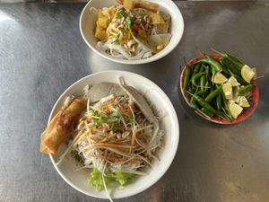 Two breakfast dishes and peppers   at Tue Tam in Da Nang