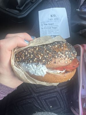 everything bagel with cream cheese and sliced tomatoes  at Deig Bakery in Reykjavik
