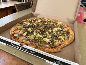 Take out Lopiez vegan pizza  at Lopiez in Davenport