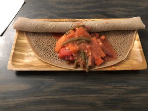 The beet vegetable medley on the injera bread. at Nile Vegan in Columbus