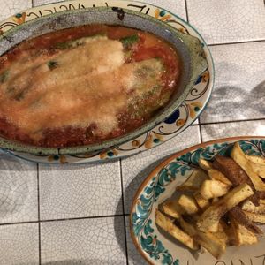 Vegan asparagus in fresh tomato sauce with bechamel/mozzarella and fresh fried potatoes  at Il-Panzier in Gozo