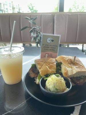 Bacon, Brie, Me with a side dish of potato salad    at Rebel Cheese in Austin