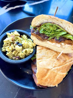 Bacon, brie, me with pasta salad side   at Rebel Cheese in Austin