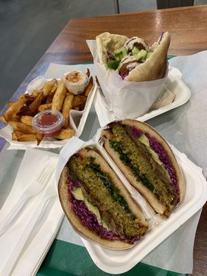 Kale burger and falafel sandwich Plus sweet potato fries at Fala Bar in Santa Barbara