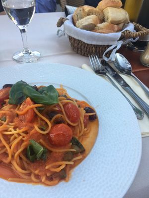 Spaghetti Puttanesca and homemade bread at Da Noi in Seeshaupt