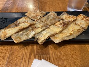 Banana naan bread - no whipped cream 🙀  at Dough Zone - Pine St in Seattle