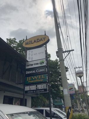 outside sign at Corner Tree Cafe in Makati