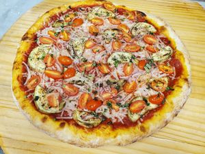 Grilled Eggplant,  Cherry Tomato, and Red Onion Vegan Pie at Pasquale's Pizzeria III in Middletown