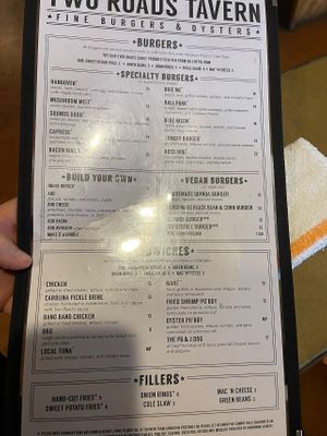 Good choices. Wife and I had Beyond burgers. Son had real meat. All good!!!!! Fries are awesome.   at Two Roads Tavern in Kill Devil Hills