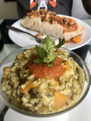 Kichari, with burrito in the background - both vegan! at Aum Cafe in Varanasi