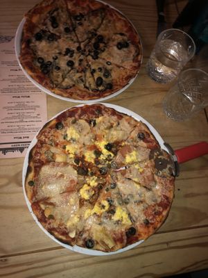 Aubergine pizza with extra olives and a ‘ham’ and ‘egg’ pizza, wow!  at Sora Lella Roman Vegan Restaurant in Edinburgh