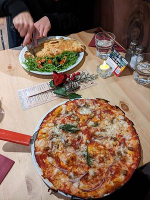 Vegan pizza and calzone at Sora Lella Roman Vegan Restaurant in Edinburgh