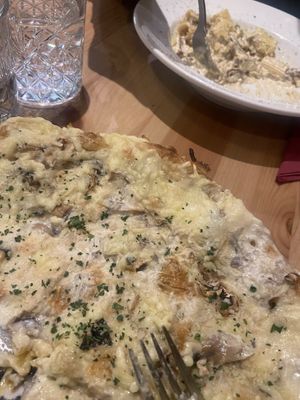 Four cheese and mushroom blanco pizza and carbonaraa  at Sora Lella Roman Vegan Restaurant in Edinburgh