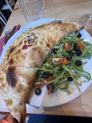 Ortolana pizza as a calzonee  at Sora Lella Roman Vegan Restaurant in Edinburgh