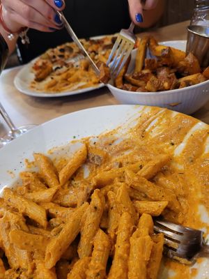 Creamy pasta and very nice crunchy chips at Sora Lella Roman Vegan Restaurant in Edinburgh