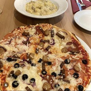 meat feast pizza   at Sora Lella Roman Vegan Restaurant in Edinburgh