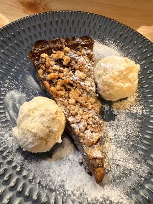 Chocolate, orange tart w hazelnuts — and ice cream   at Sora Lella Roman Vegan Restaurant in Edinburgh