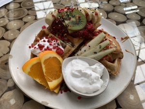 Waffles with peanut butter, chia jam and coconut yoghurt. I should have got maple syrup as it was too dry for me    at Barefoot Eatery in Christchurch