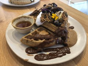 Buckwheat waffles with peanut butter and blackcurrants  at Barefoot Eatery in Christchurch