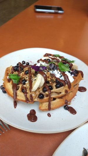 Peanut butter and blackcurrants waffles at Barefoot Eatery in Christchurch