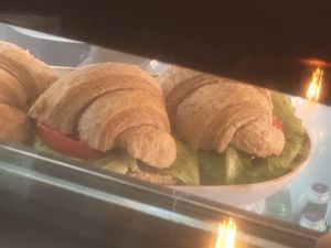 croissant, hummus, tomato, lettuce at Green & Yang in Mexico City