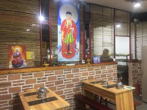  Multiple cozy seating areas at ZhengNian Vegan Buffet in Qufu