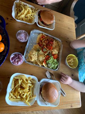 Cheese and flak8n vegan burgers with nachos at The Ridge Bar & Grill in Swindon