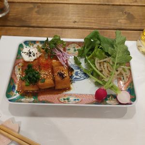 Sort of braised tofu and pickles at Fujifuku in Tokyo