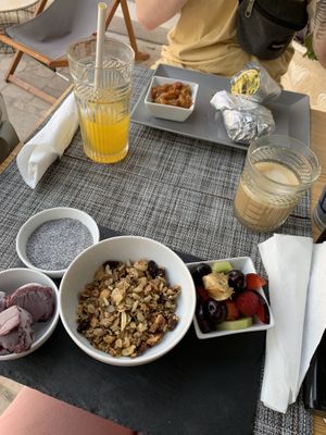 Açai bowl with homemade granola and chia pudding and the vegan burrito with mild salsa   at Al-Gharb Coffee Roasters in Albufeira