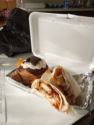 Crispy BBQ chicken wrap and jumbo chocolate cupcake. at Yes It's Fresh in Cleveland
