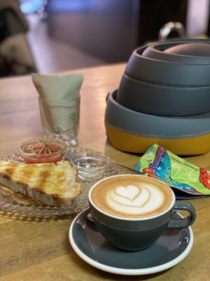 Oat milk latte and tomato toast. So good. Perfect after a bike ride! at Blackbird in Valencia