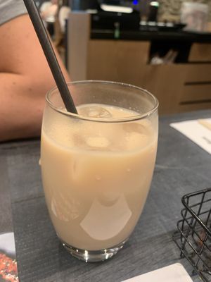 Latte with oat milk   at LHR - Wagamama - T3 in West London