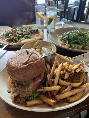 Fried chicken burger was amazing. Pizza and black truffle sweet potato gnocchi were okay    at Plum Bistro in Seattle