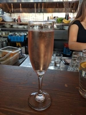 Pink Prosecco and a less than lovely view at the bar at Plum Bistro in Seattle