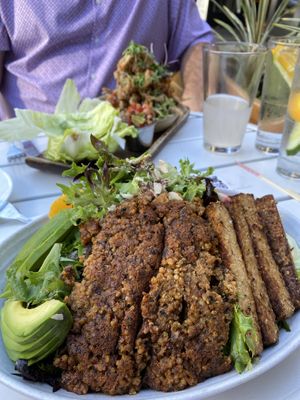 Salad COVERED in vegan meat - not great   at Plum Bistro in Seattle